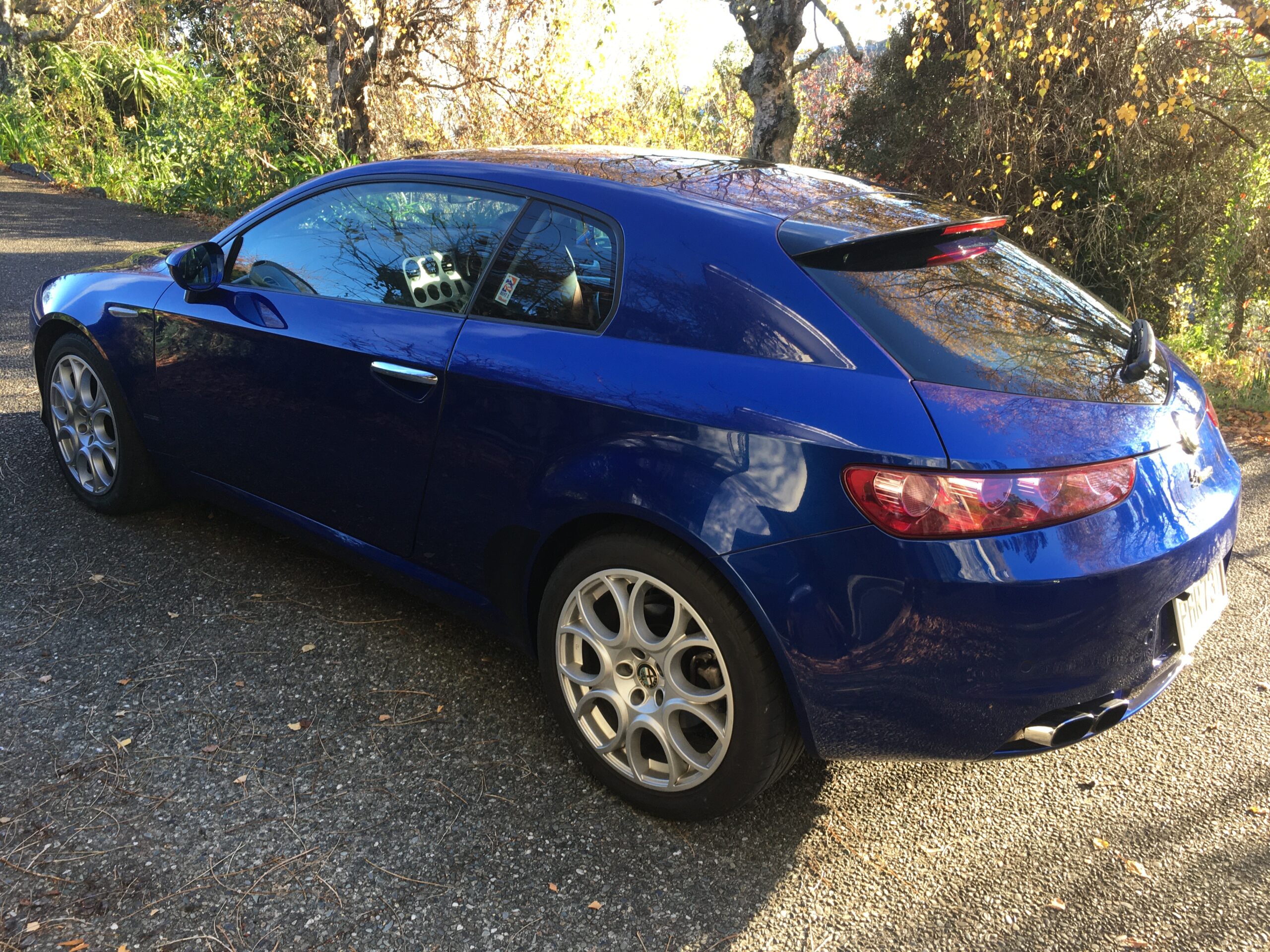 Blue Alfa Romeo Brera rear three quarters shot